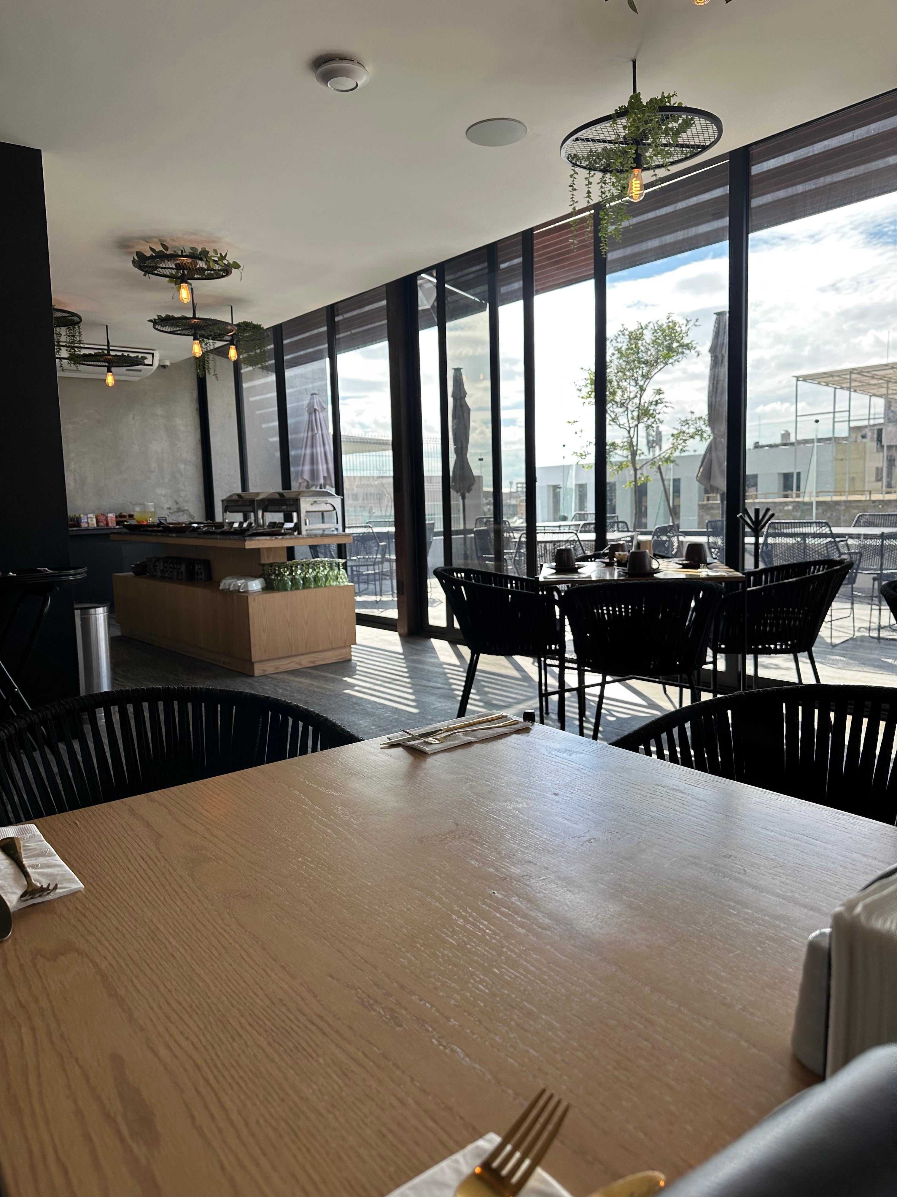 There is a restaurant on the top floor with excellent food & service.