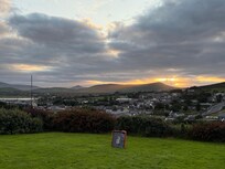 Sunset over town from the front yard