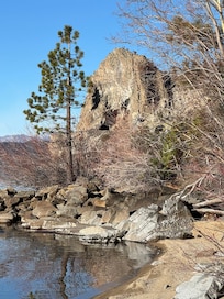 View of cave rock from the beach at the cabin