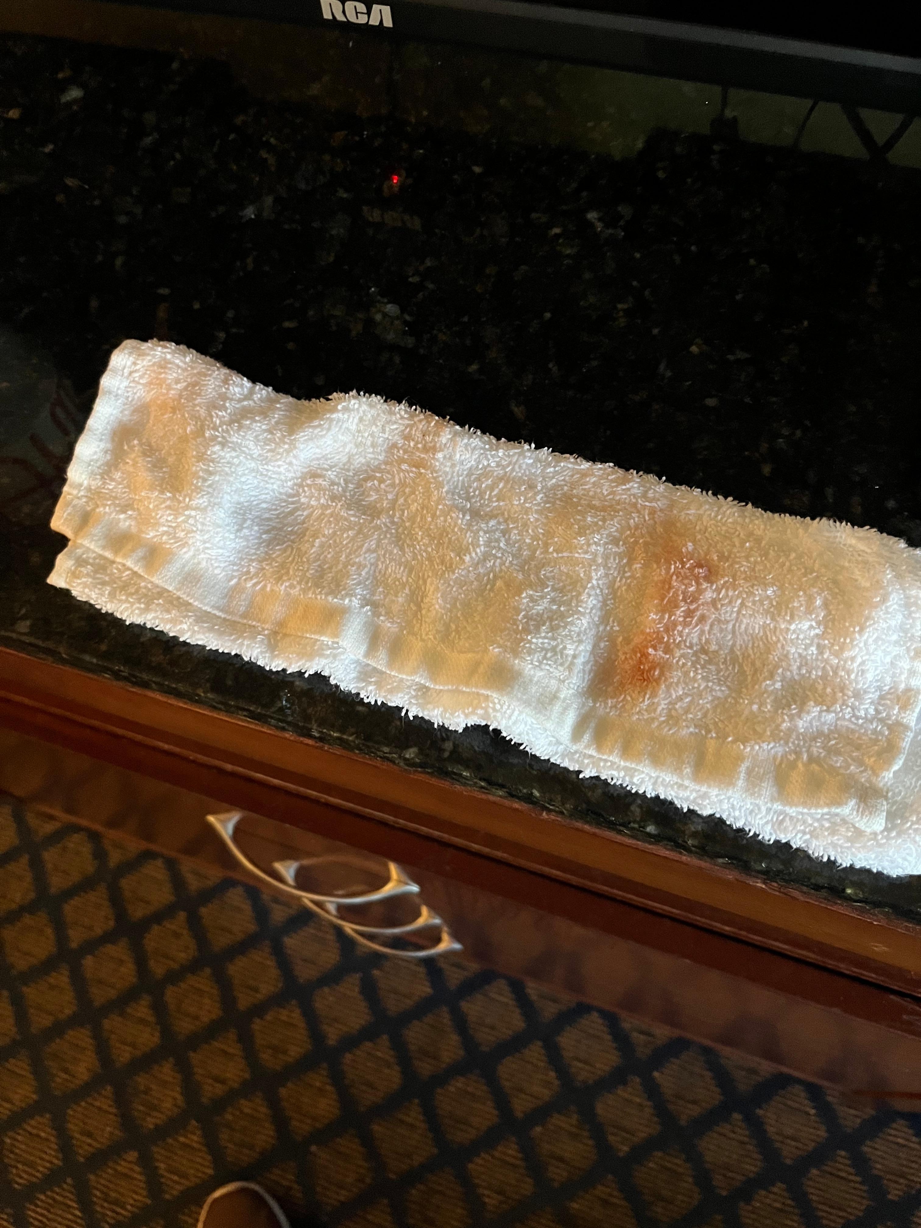 Dirty and sticky table.  Cleaned with wash cloth.