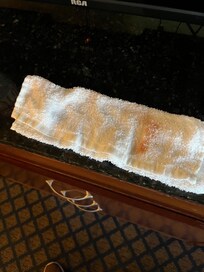Dirty and sticky table. Cleaned with wash cloth.