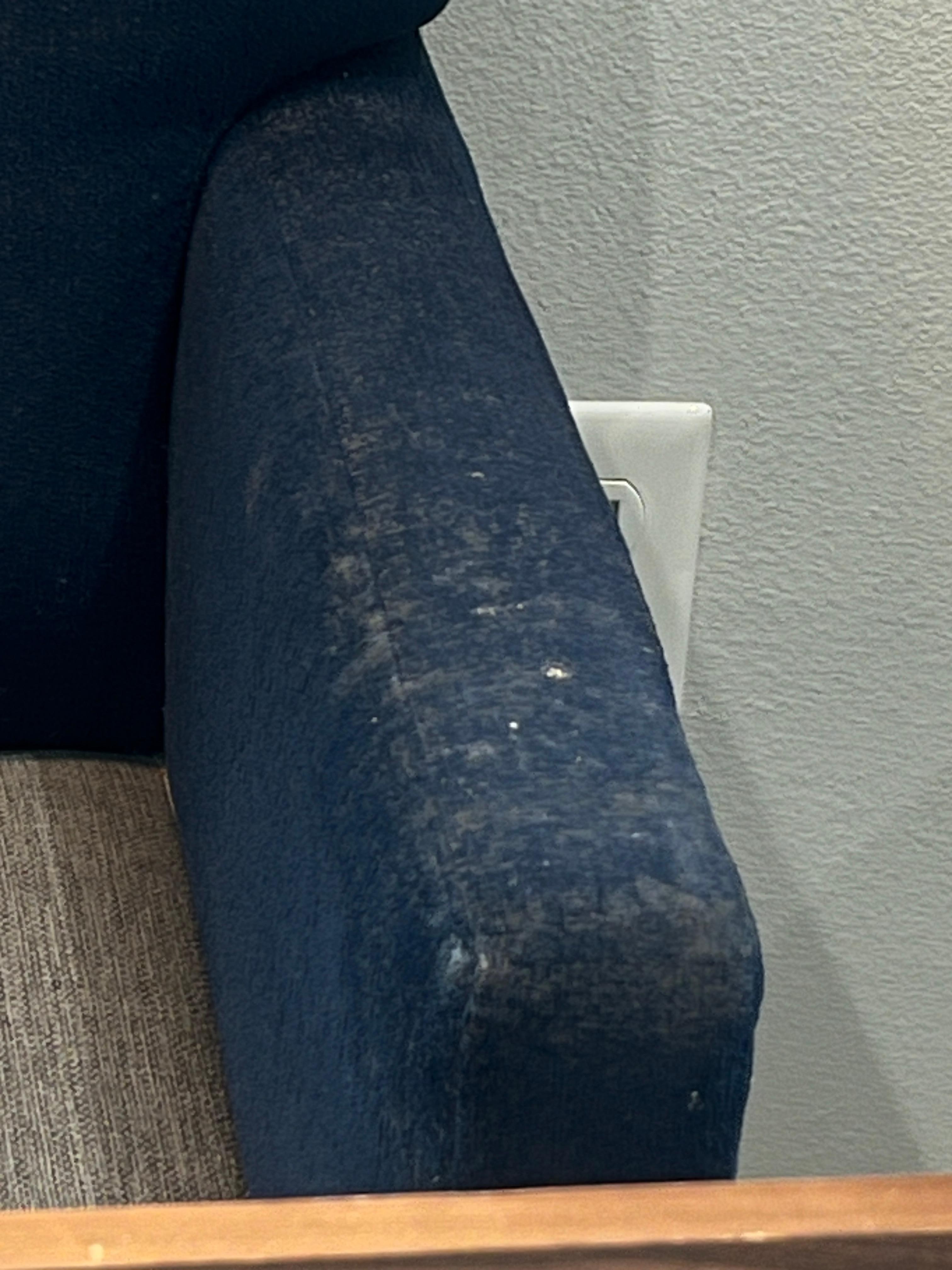 Armrests on all chairs in eating area filthy.  