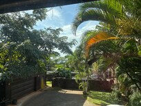 View from living room window. Ocean is there but hard to see in those photos!