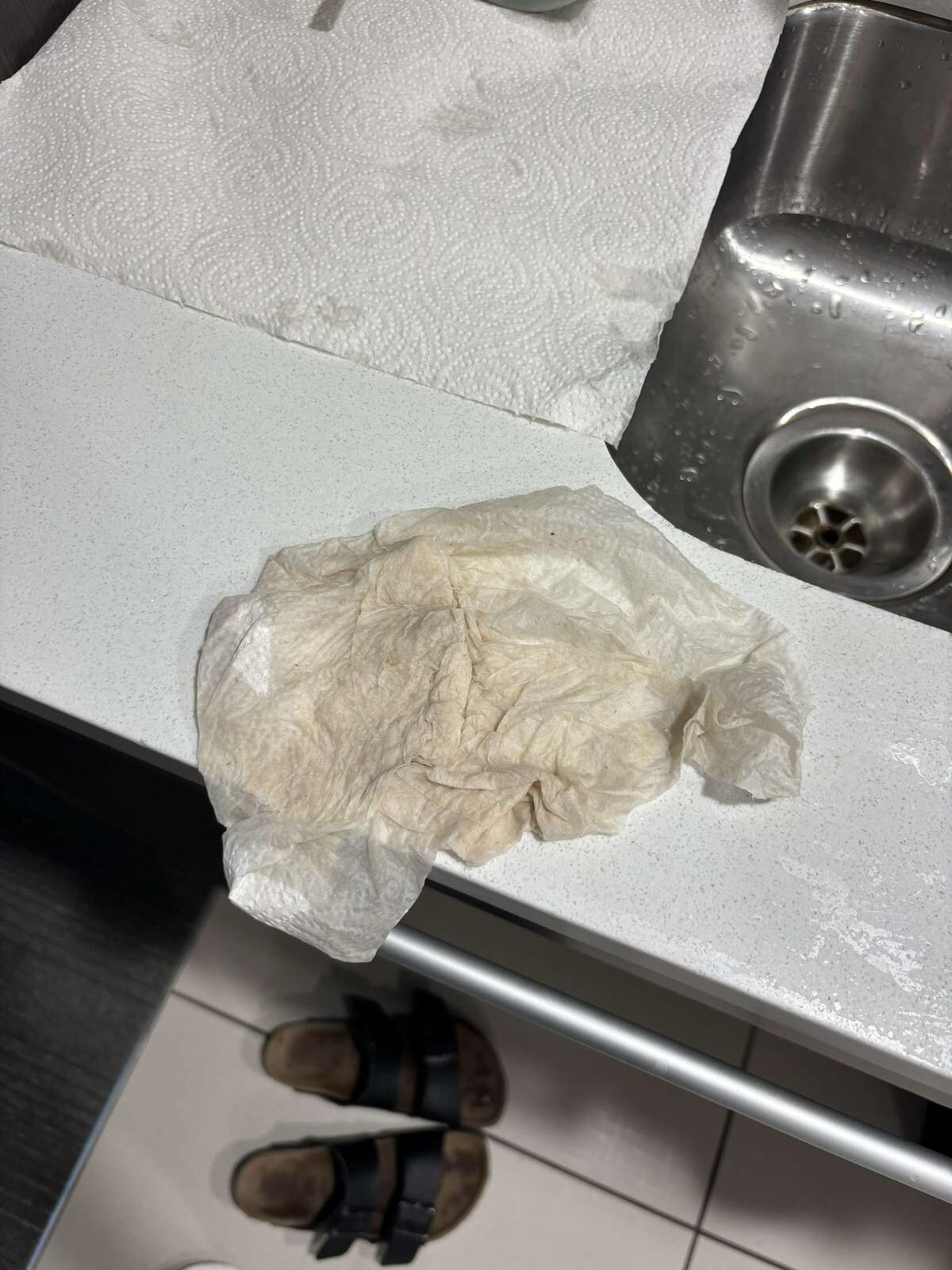 Counter in room after we on accident spilled some water we wanted to clean up and discovered how disgusting it was
