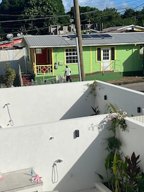 The neighbours and the view from the master bedroom window is on to a unkept space I assume waiting developments. Not a great problem