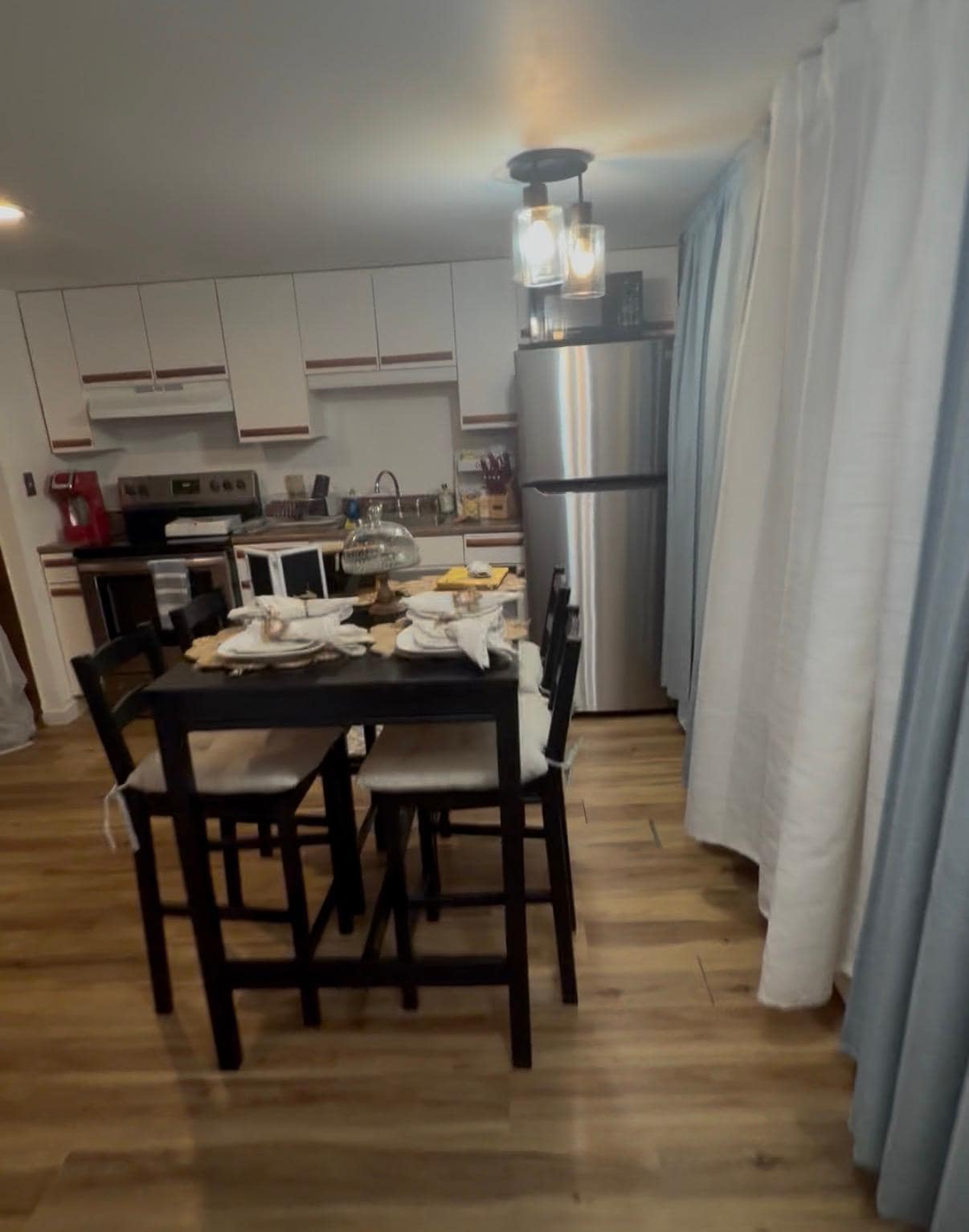 Clean kitchen with all necessities 