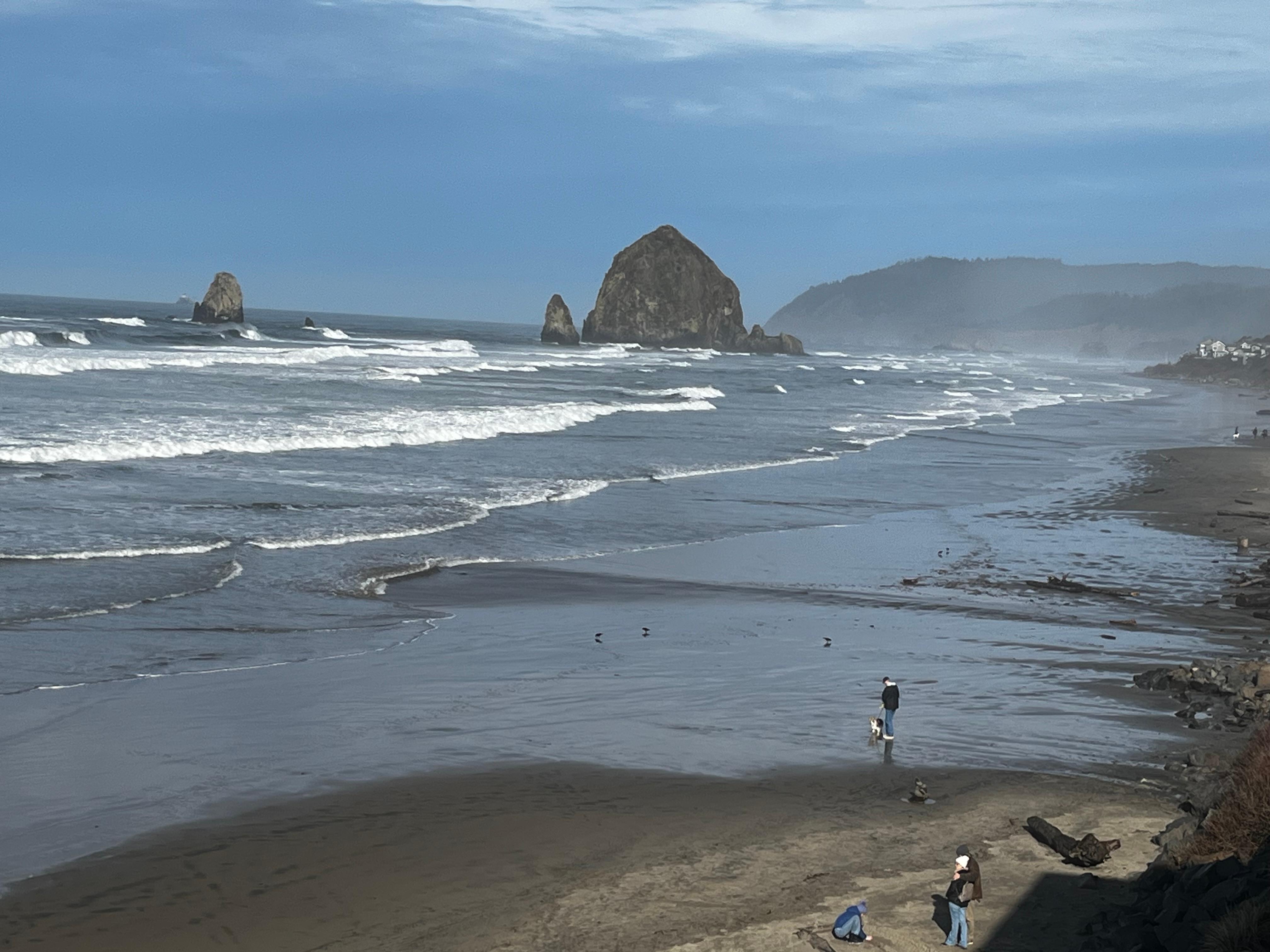 Haystack Rock with Tillamook Head Lighthouse to the far left