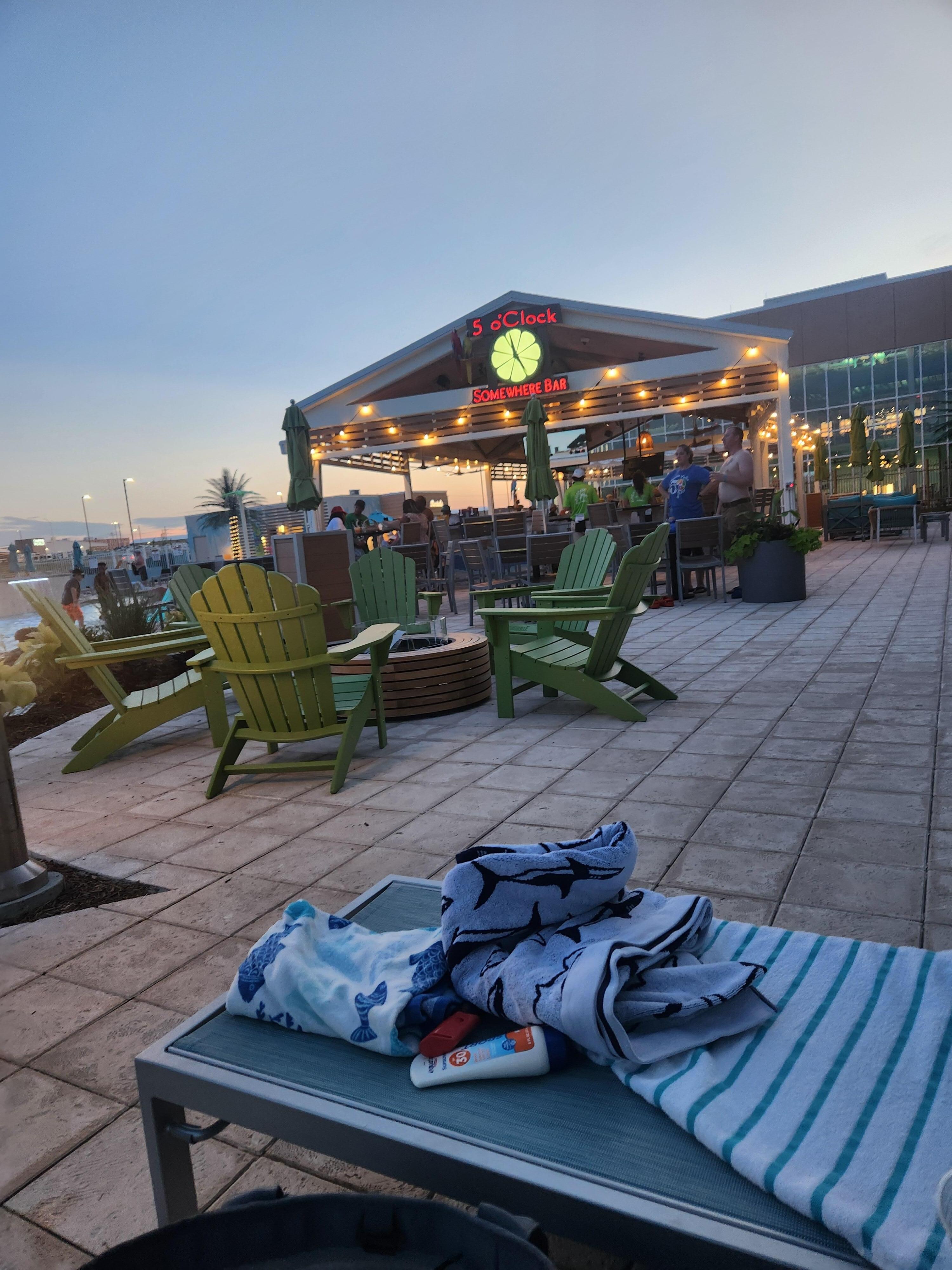 Outside bar, music, and cold water served all day.