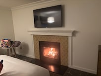 Room’s fireplace had kit in bag to light and burn.
