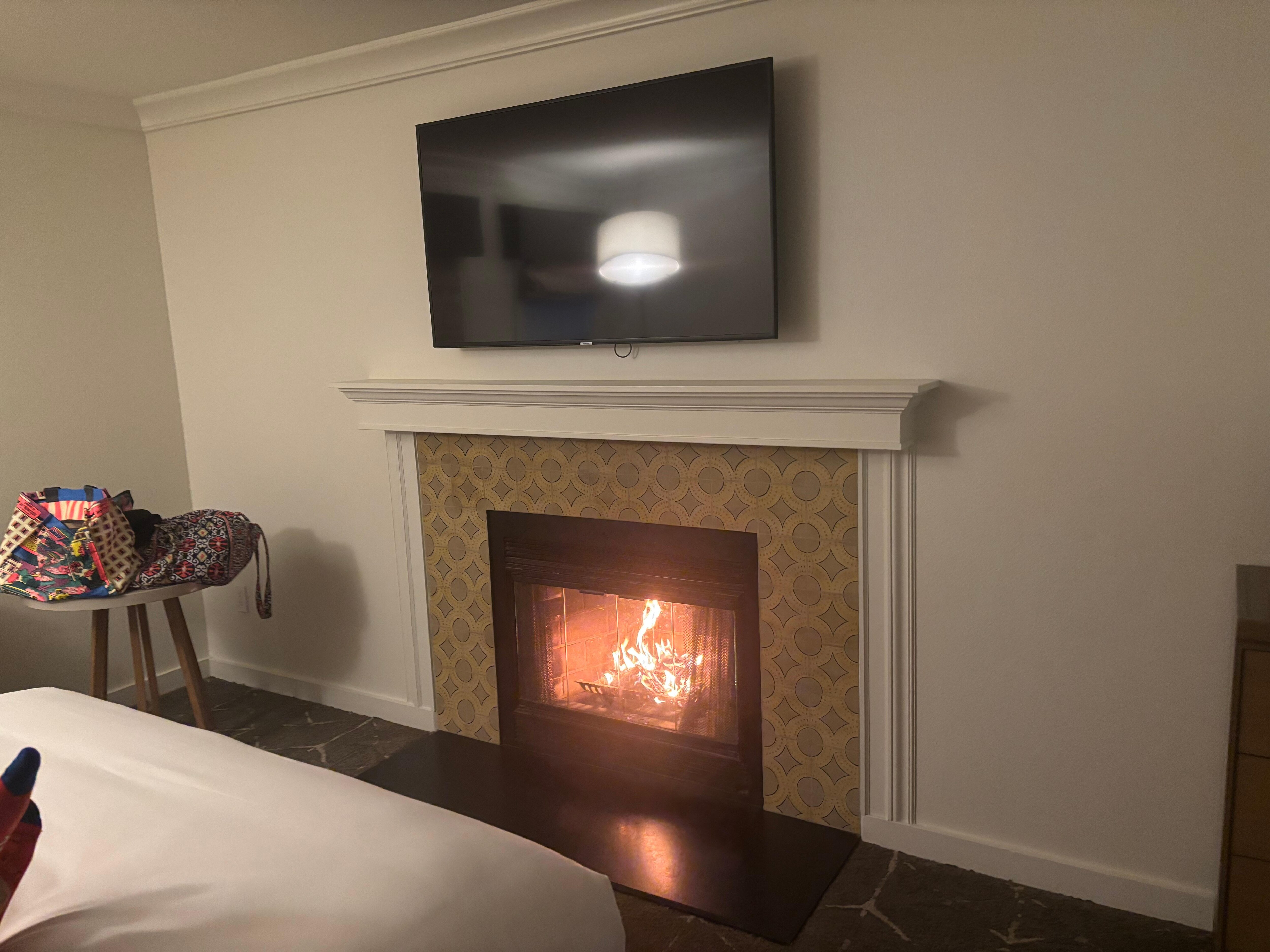 Room’s fireplace had kit in bag to light and burn.