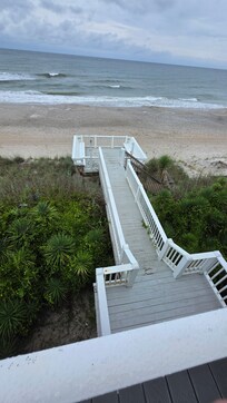 Back deck view of the shared walkway and beach.