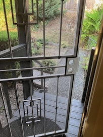 Front door screen door with no knob or lock