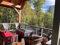 View from the deck with furniture. Table fireplace was a great plus.