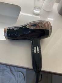 Had to pry my hands off this sticky hair dryer. When I pushed the “cool air” button, it wouldn’t come back out.