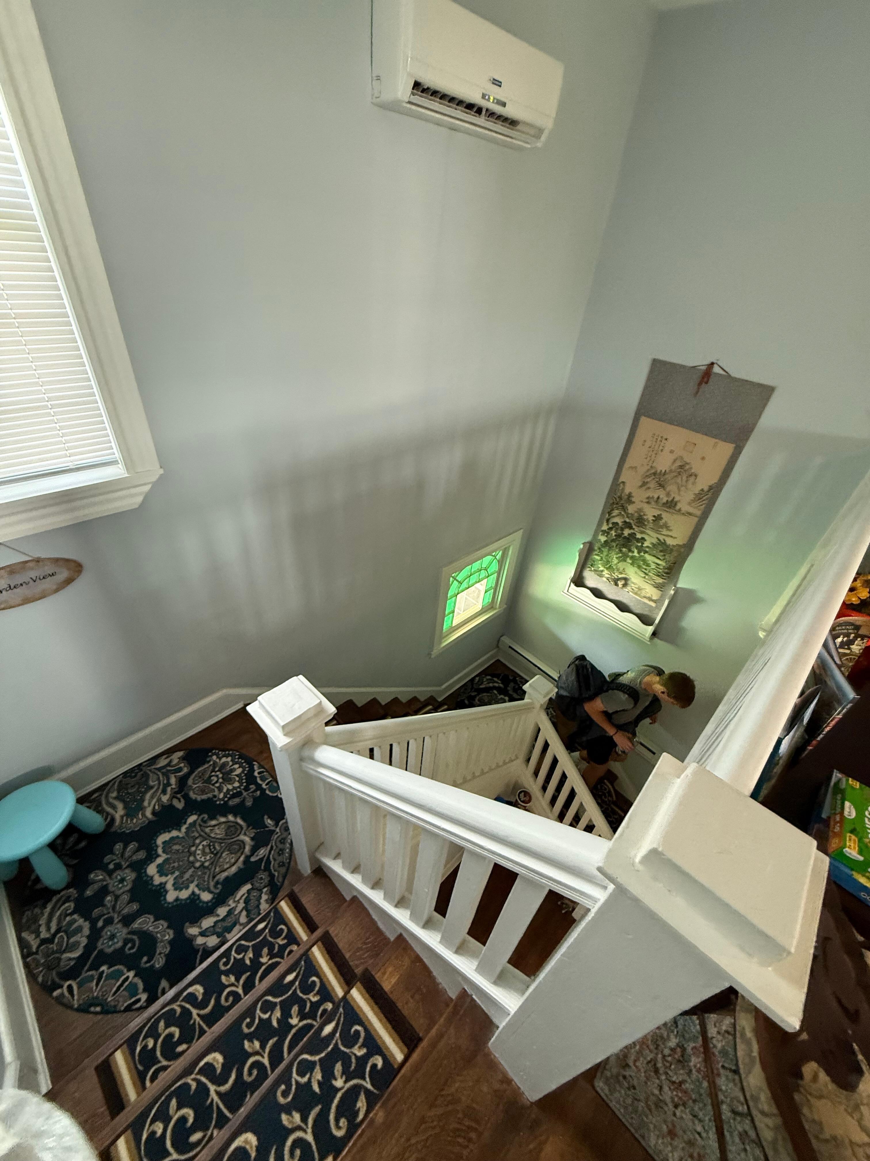 Stairway from the unit down to the private porch entrance