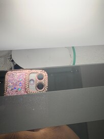 Hole in wall located by the sink