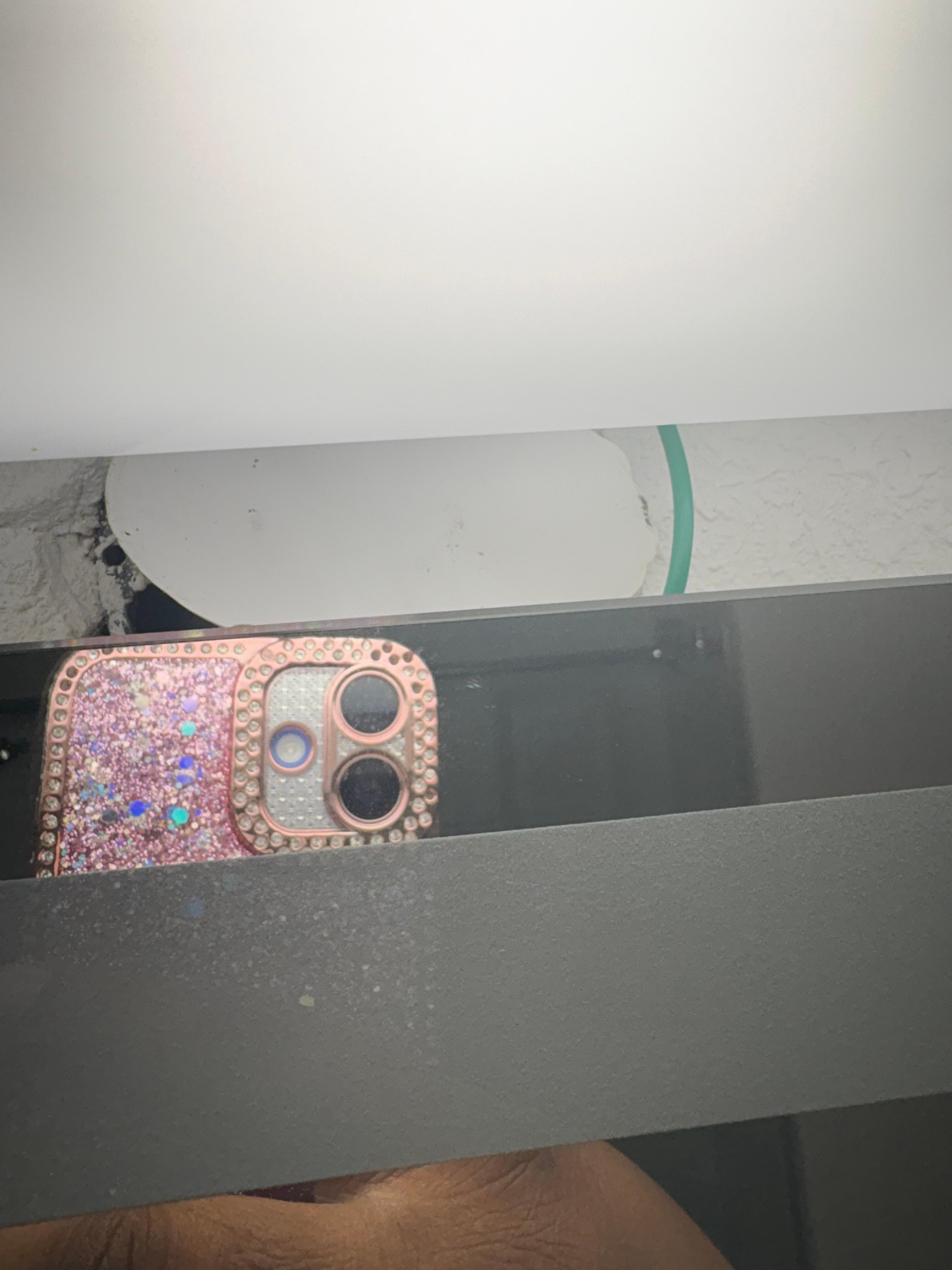Hole in wall located by the sink
