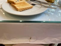 The stain on the tablecloth was there during my stay