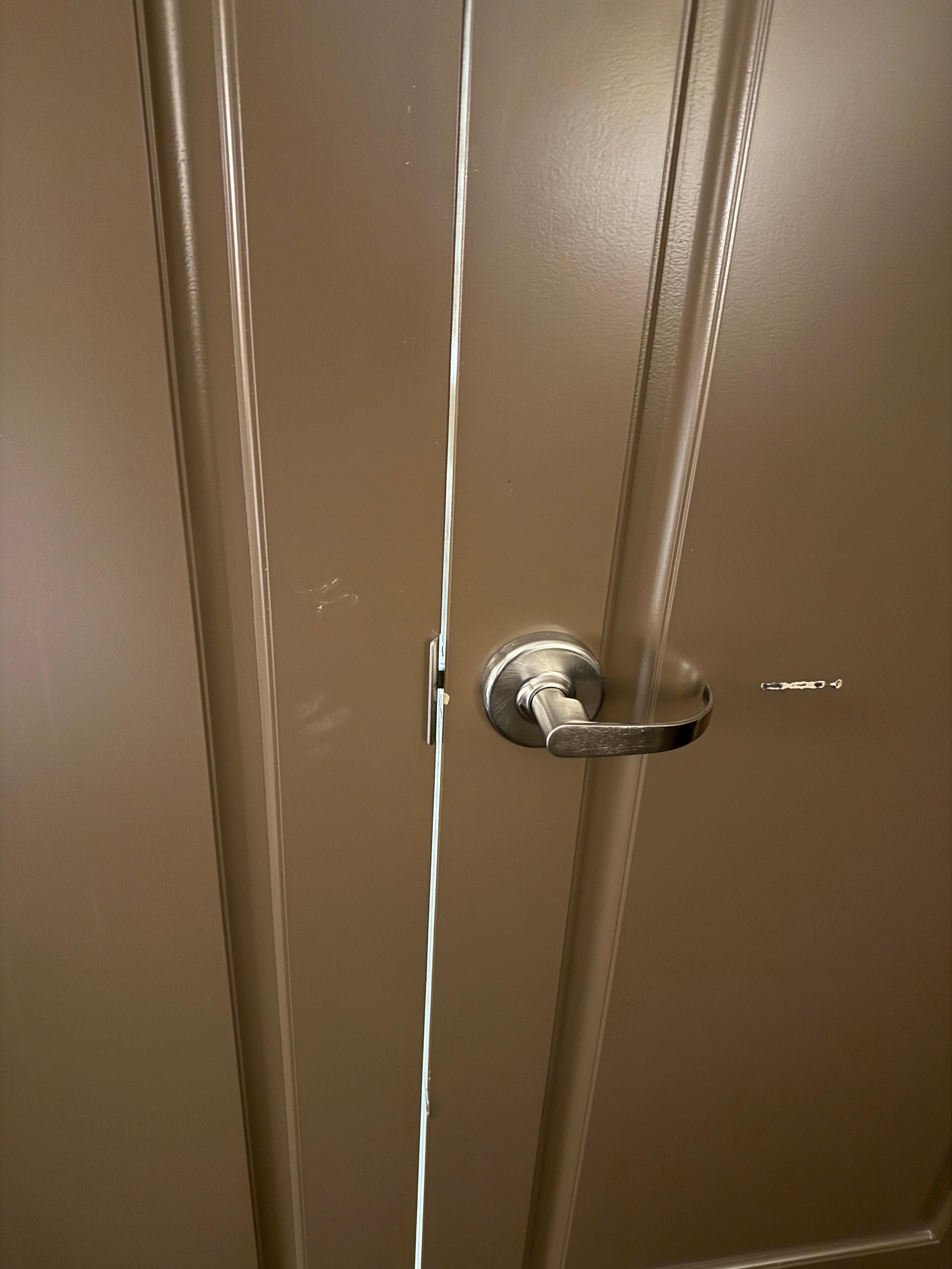 Door with finger prints + Gouge out of door 