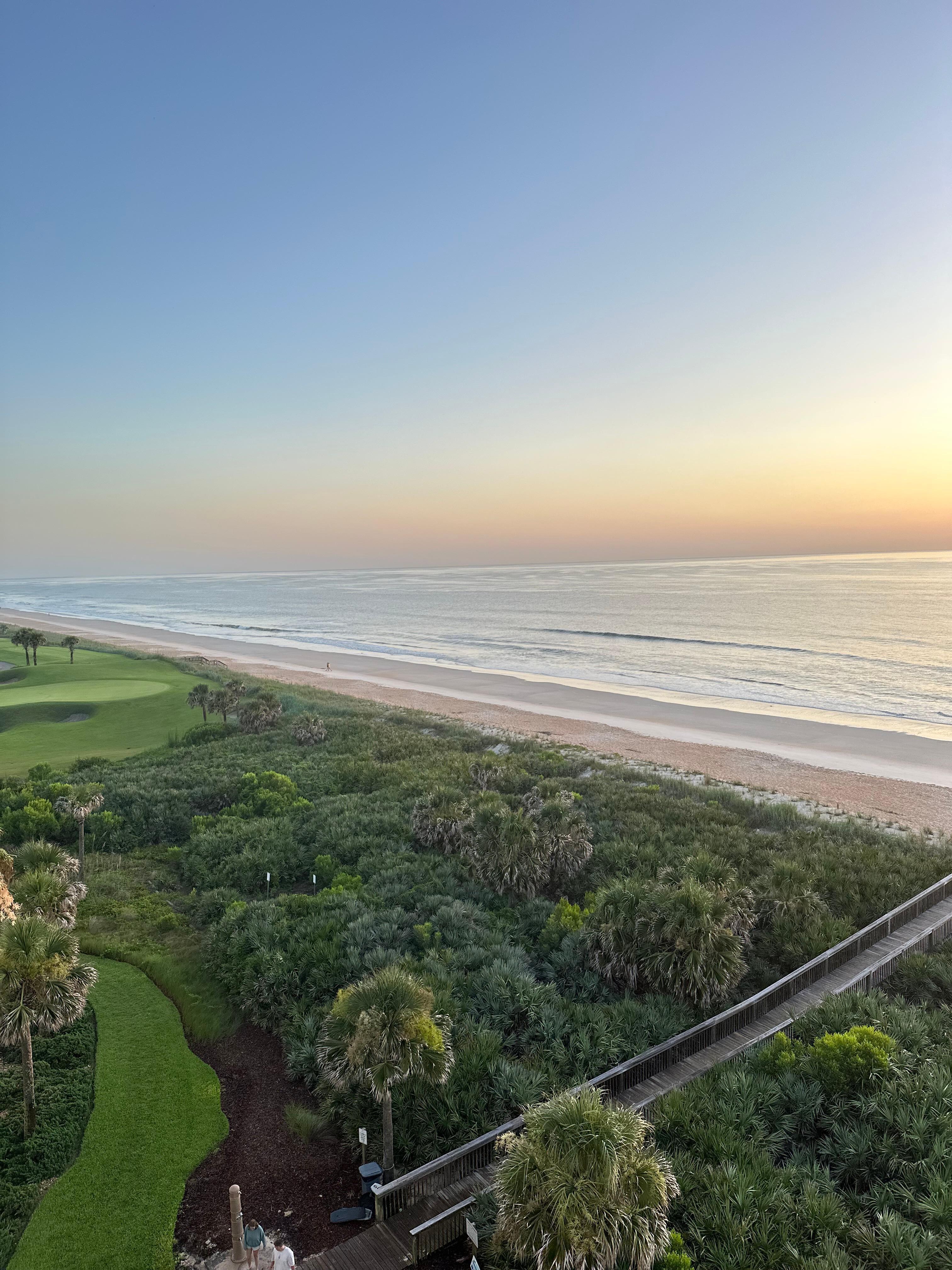 View of golf course and ocean