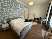 Large bedroom with queen size bed