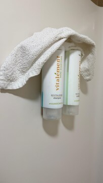 Dirty washcloth over in tub toiletries