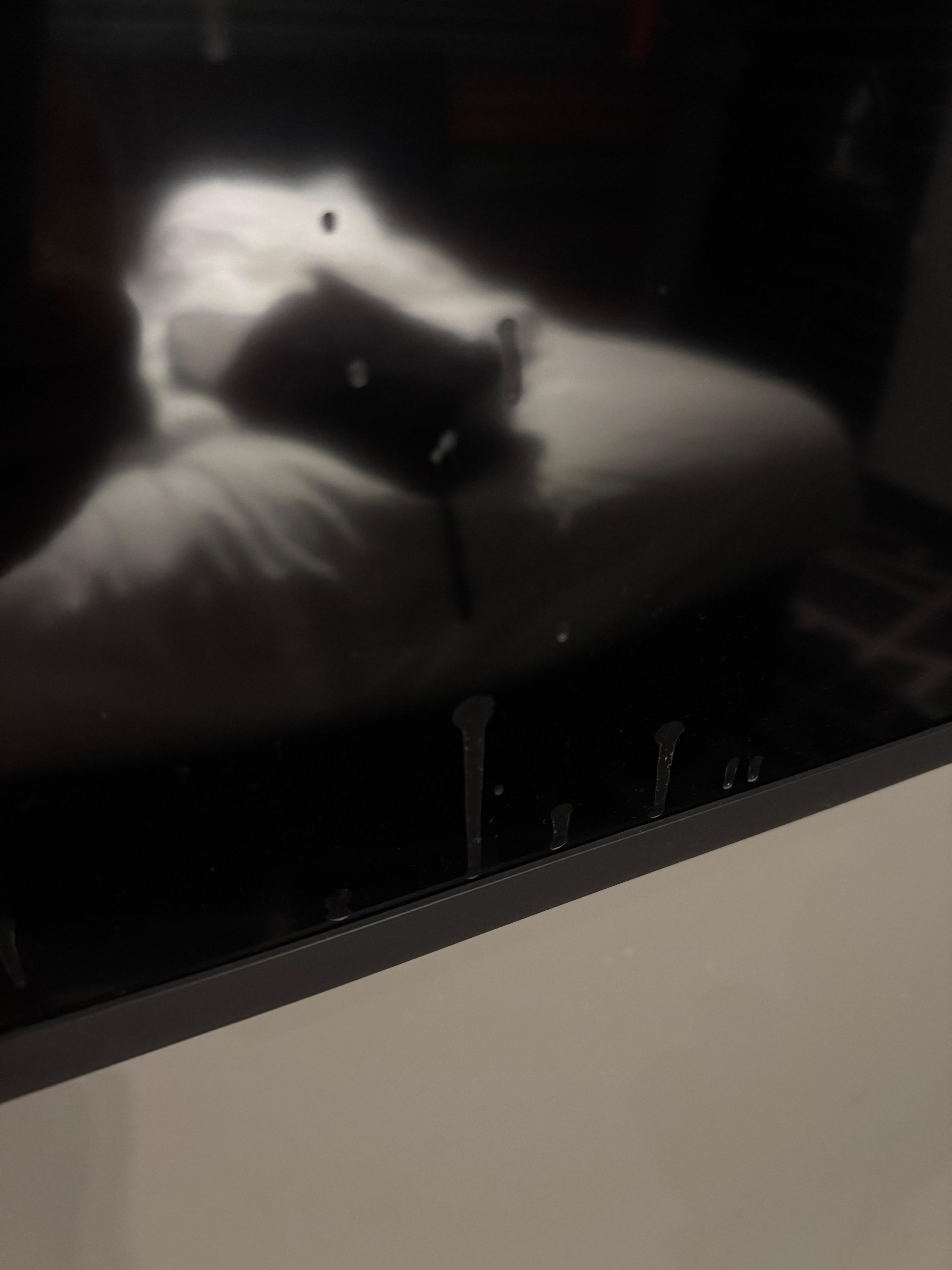 TV covered in dried brown liquid 