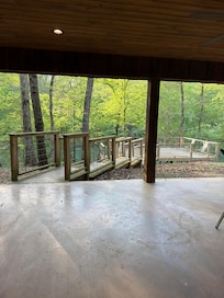 Patio looking to deck and River.