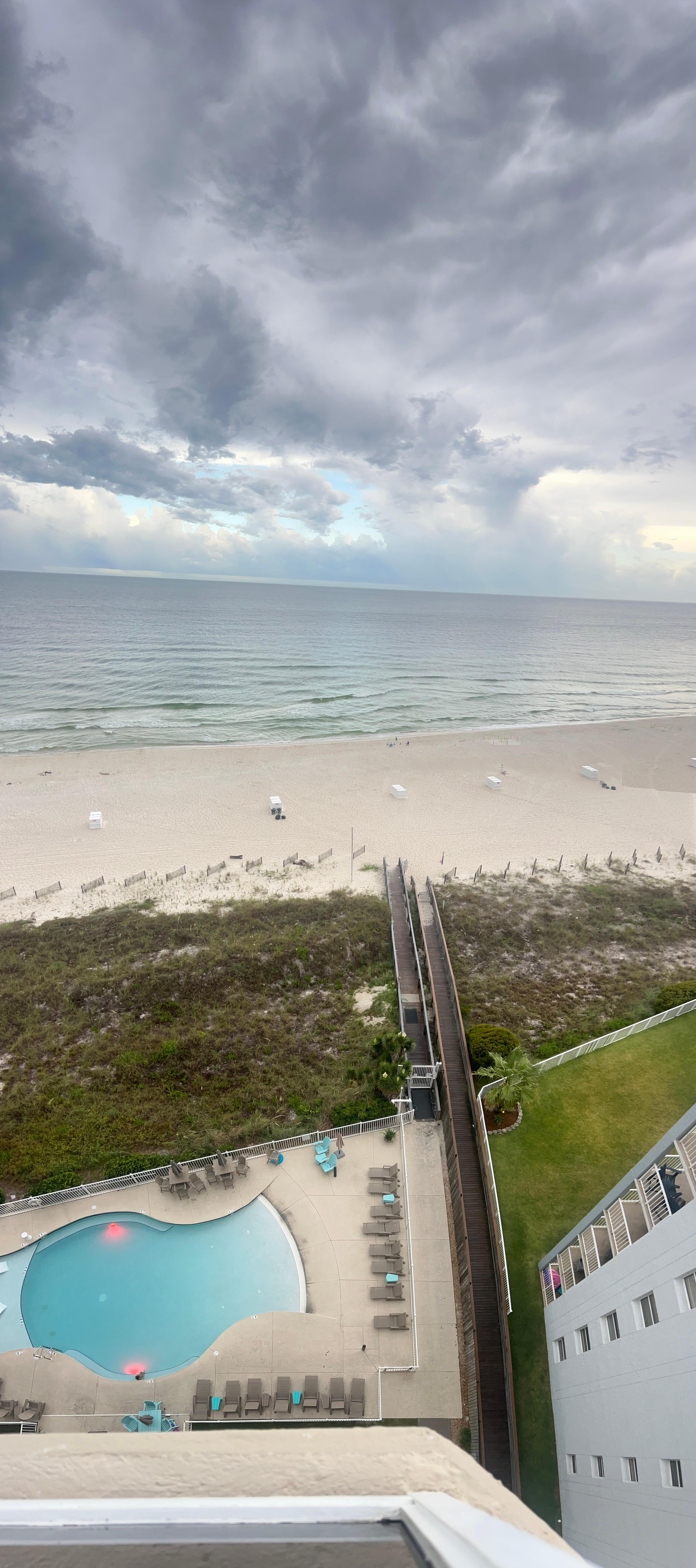 View of the beach and pool from the balcony 