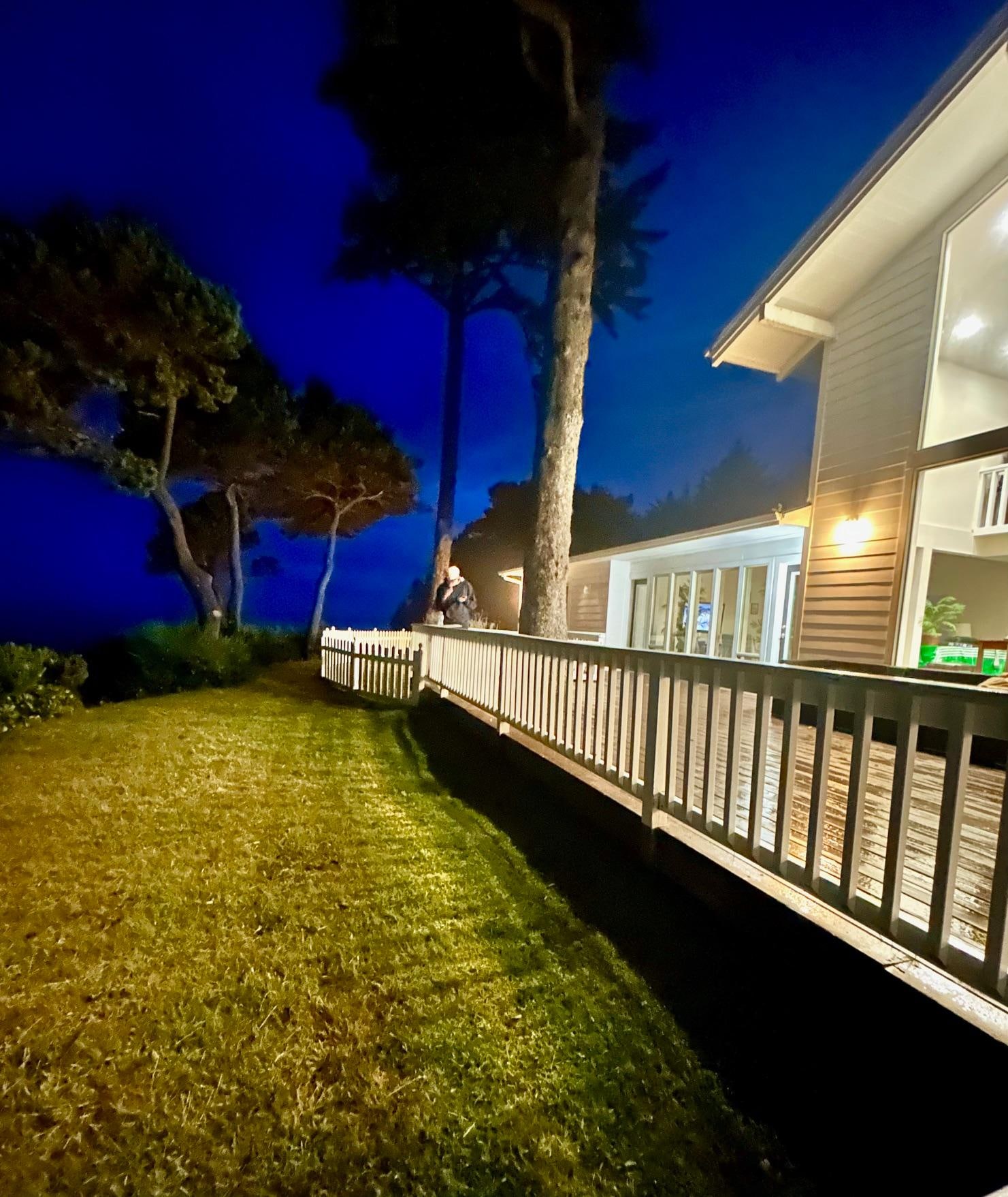 Back deck at night overlooking the ocean- beautiful!