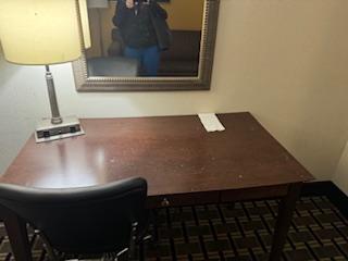 desk had sticky liquid all over it where someone had eaten