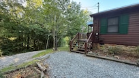 From the driveway, the access is up the steps!