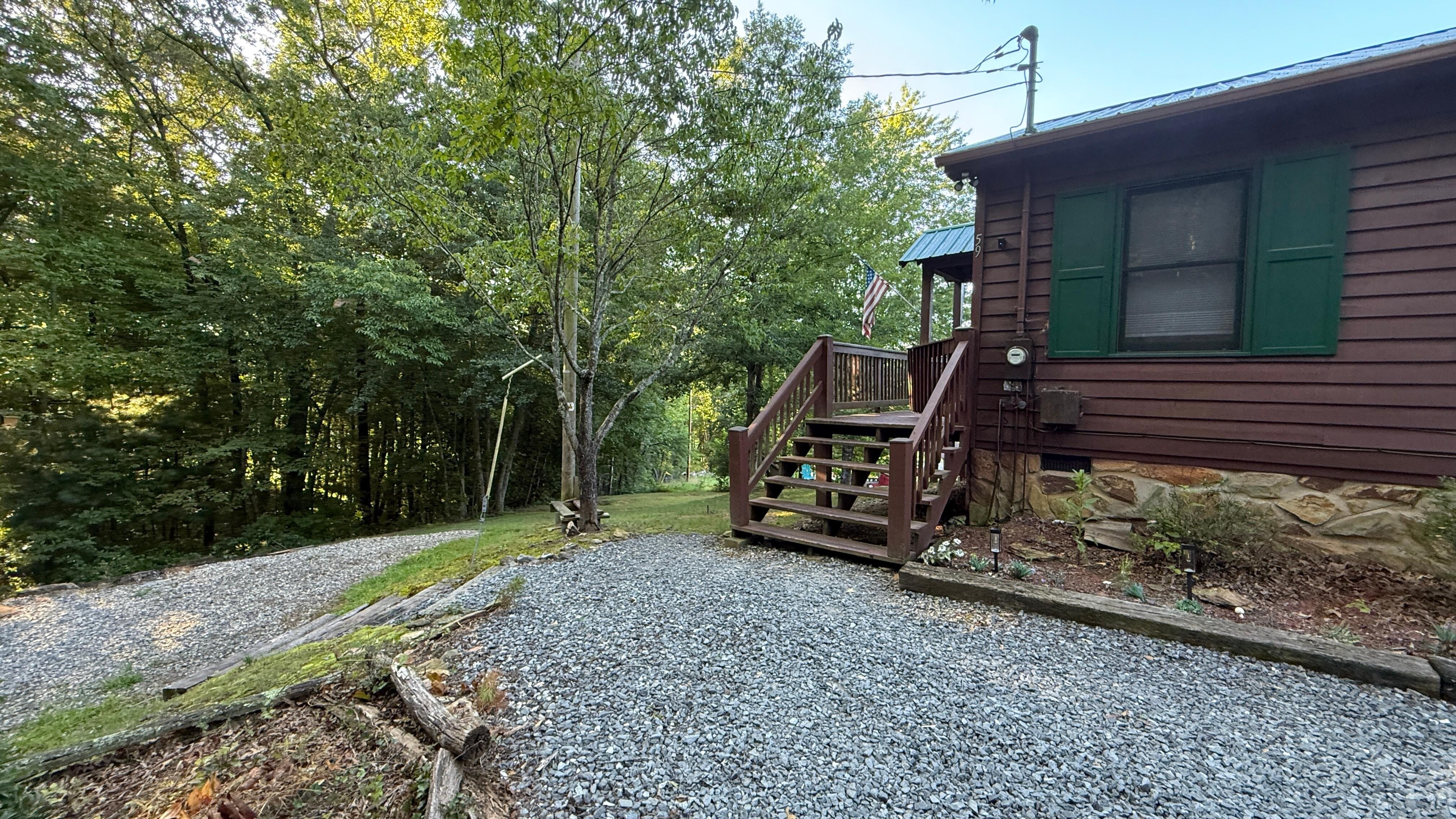 From the driveway, the access is up the steps! 