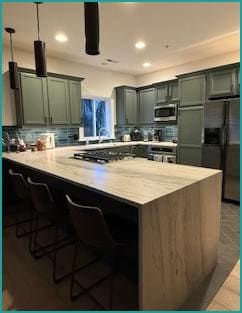 Beautiful Kitchen. I am in LOVE with the cabinet color and the countertops!!