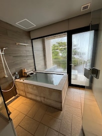 Natural hot springs in each room.