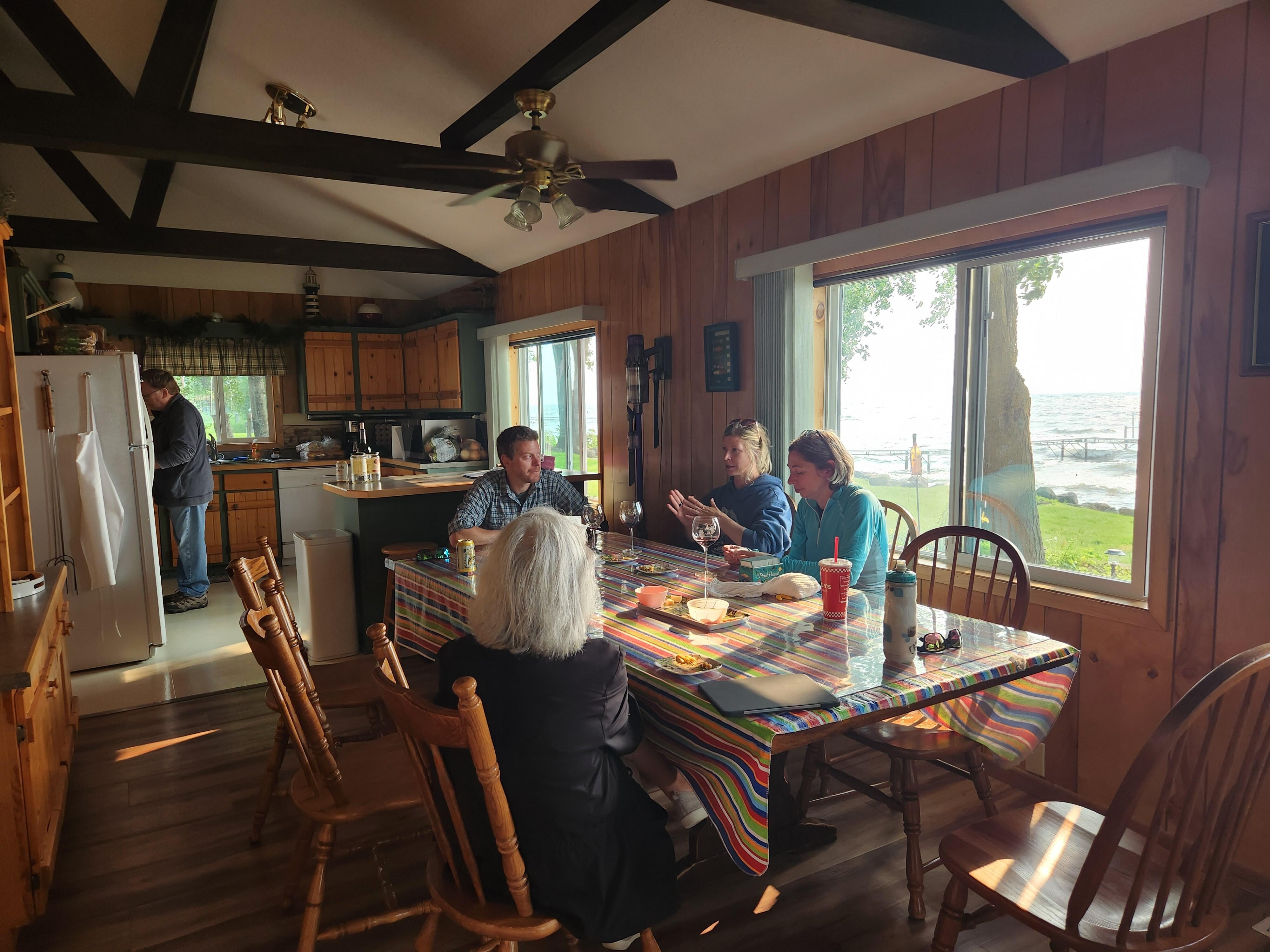 Dinner time. Big table with a view.