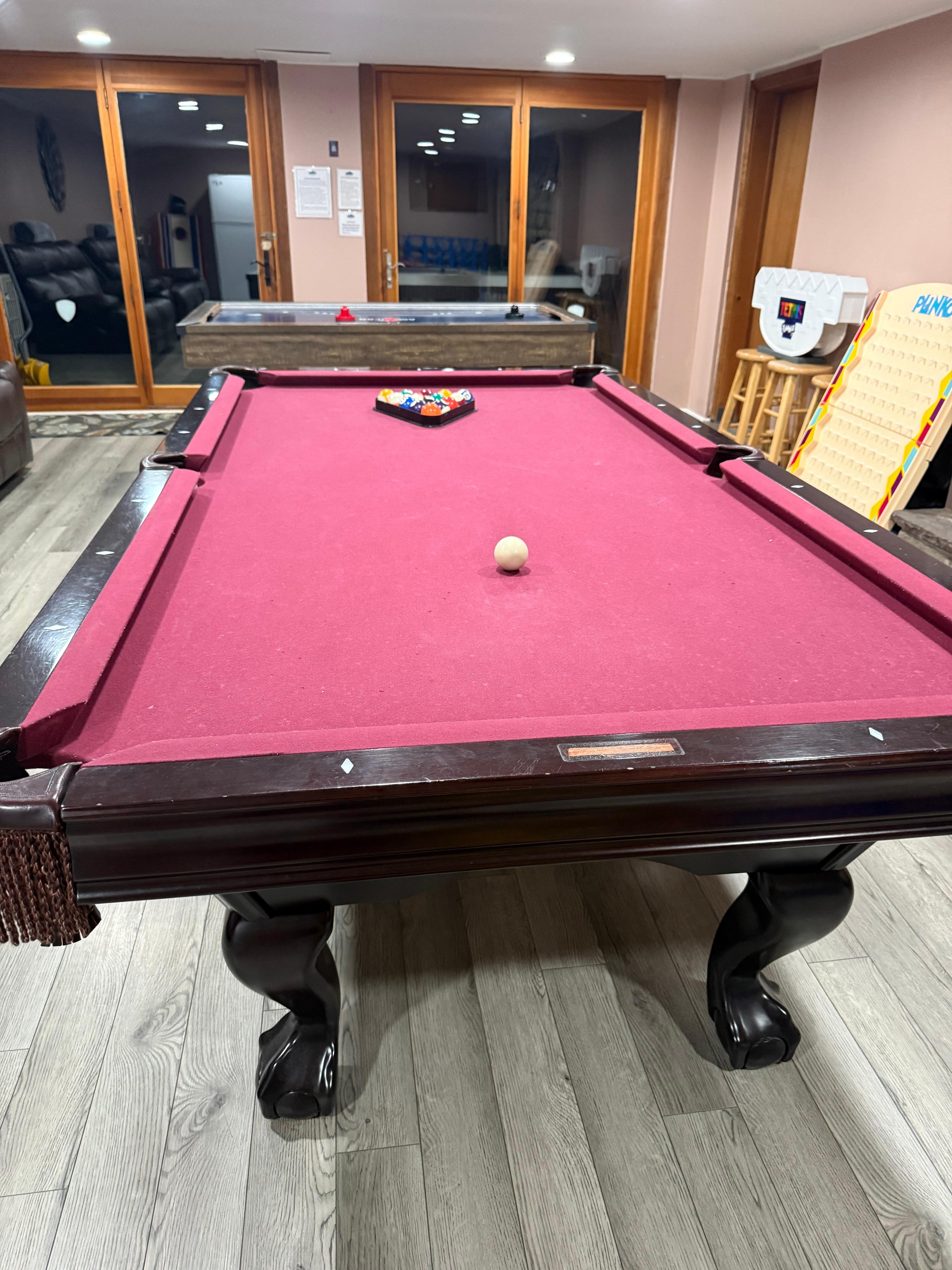 Gaming room that walks out to hot tub & fire pit 