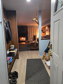 This is from the front door. Nice view to the fireplace.