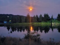 Full moon with a bit of Canadian forest fire haze still remaining.