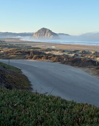 Walked pass one home and stood on the edge of the road and there it is the Rock