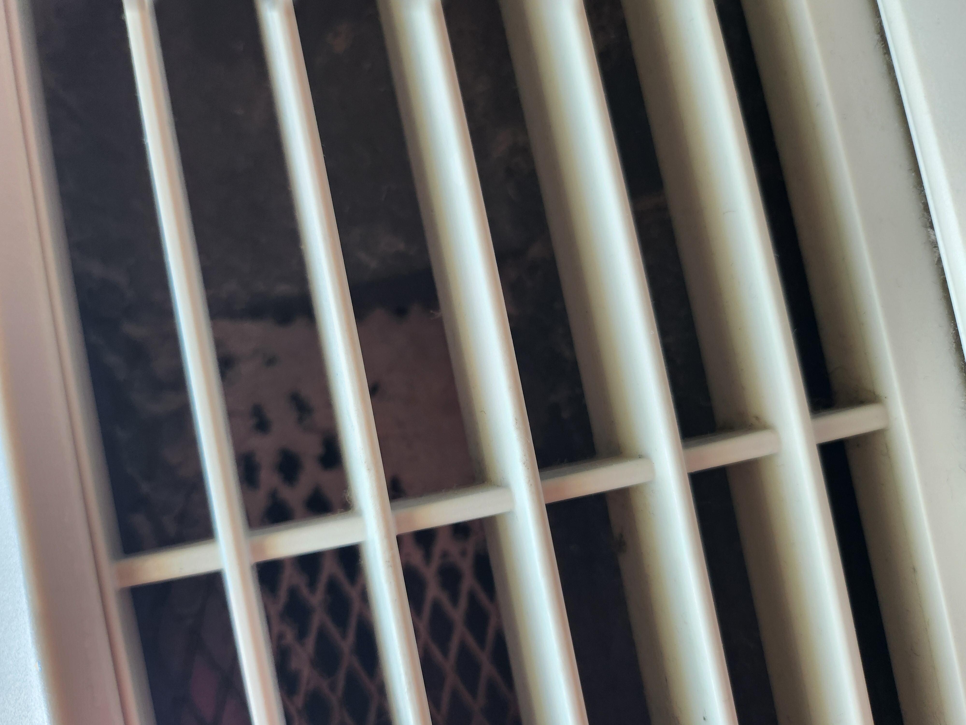 Dirty section of AC unit screen