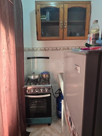 Stove splattered with yellowish matter