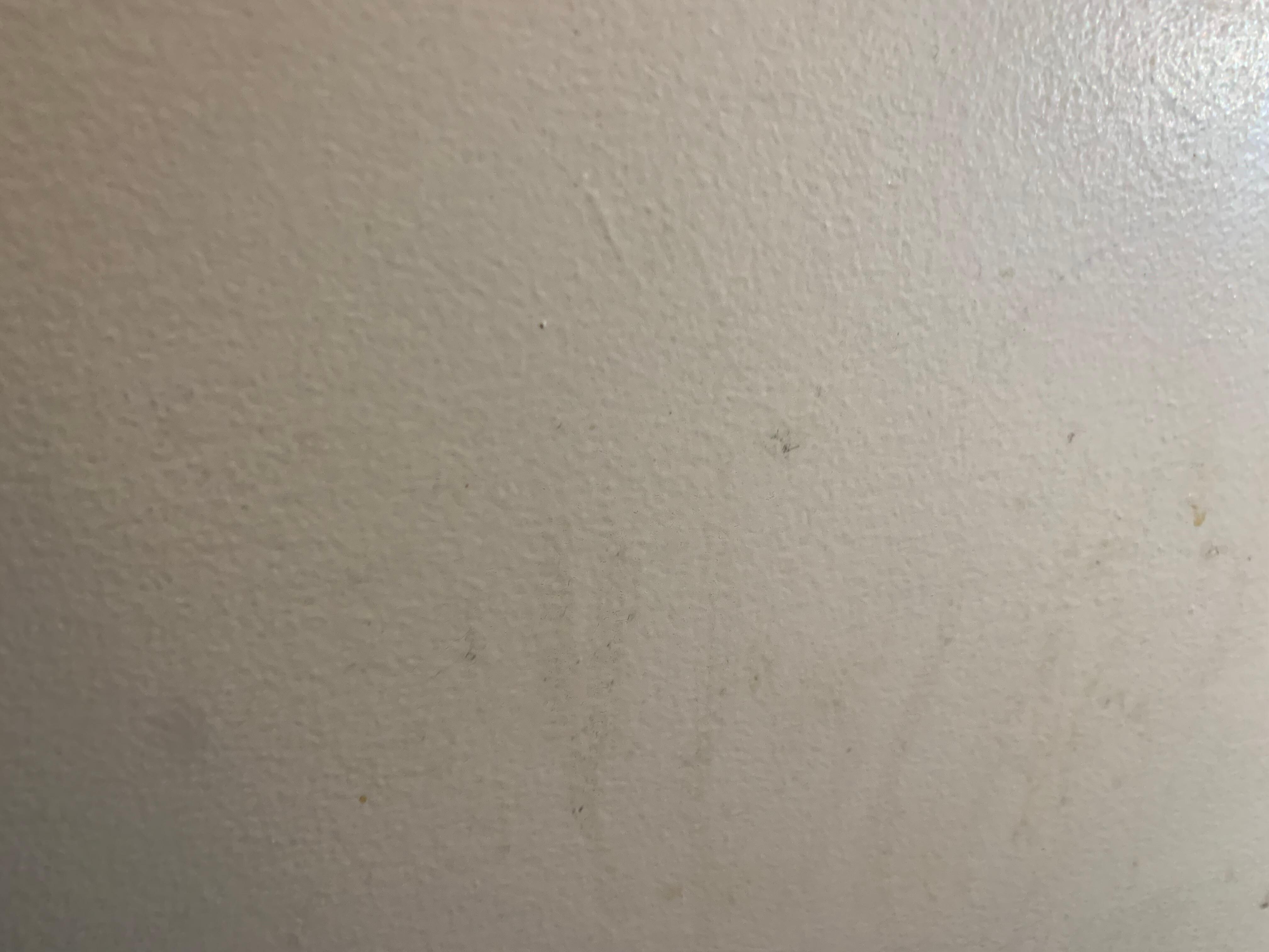 Stripes of puke on the wall