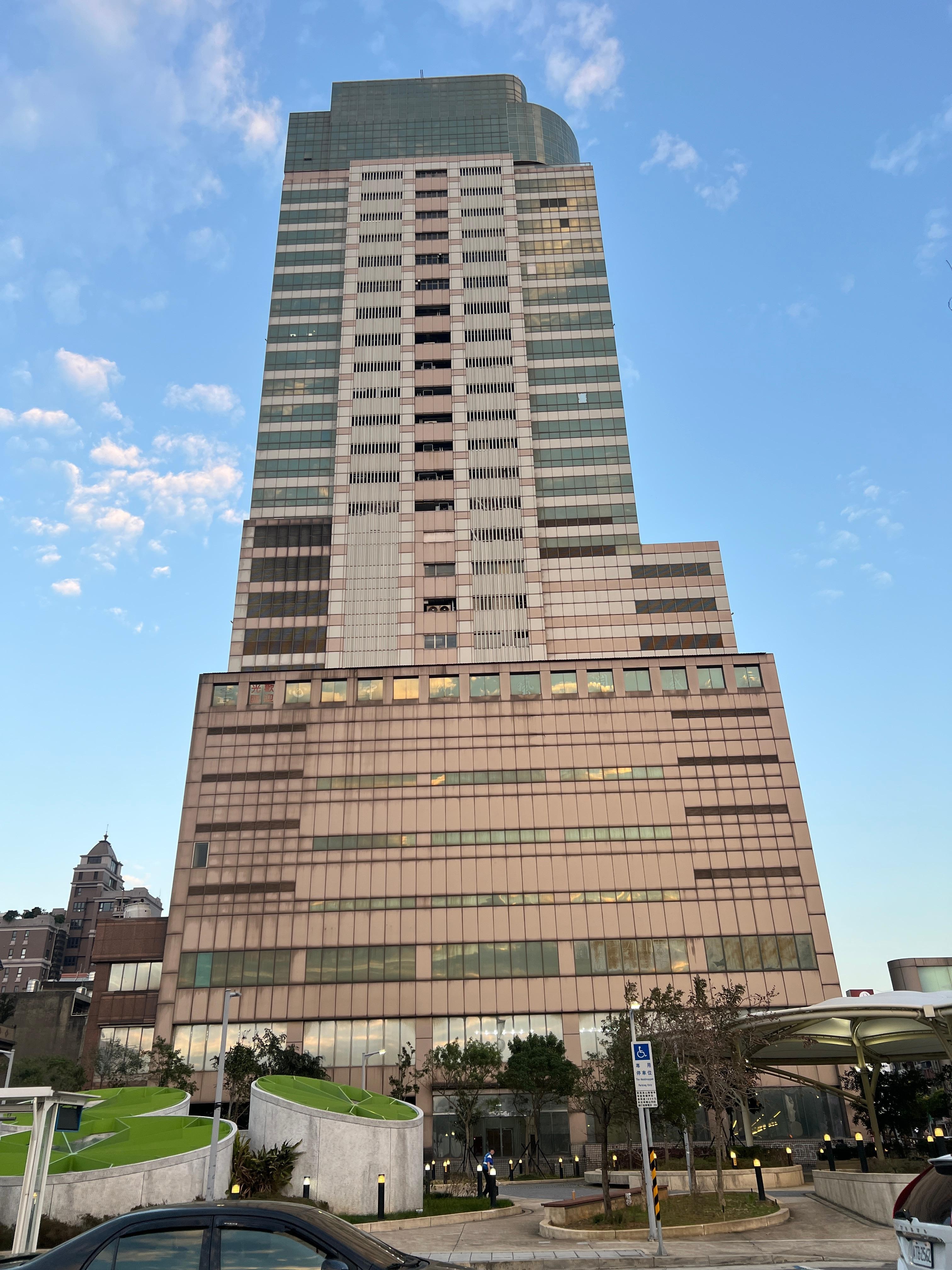 view of the building from the train station across the street