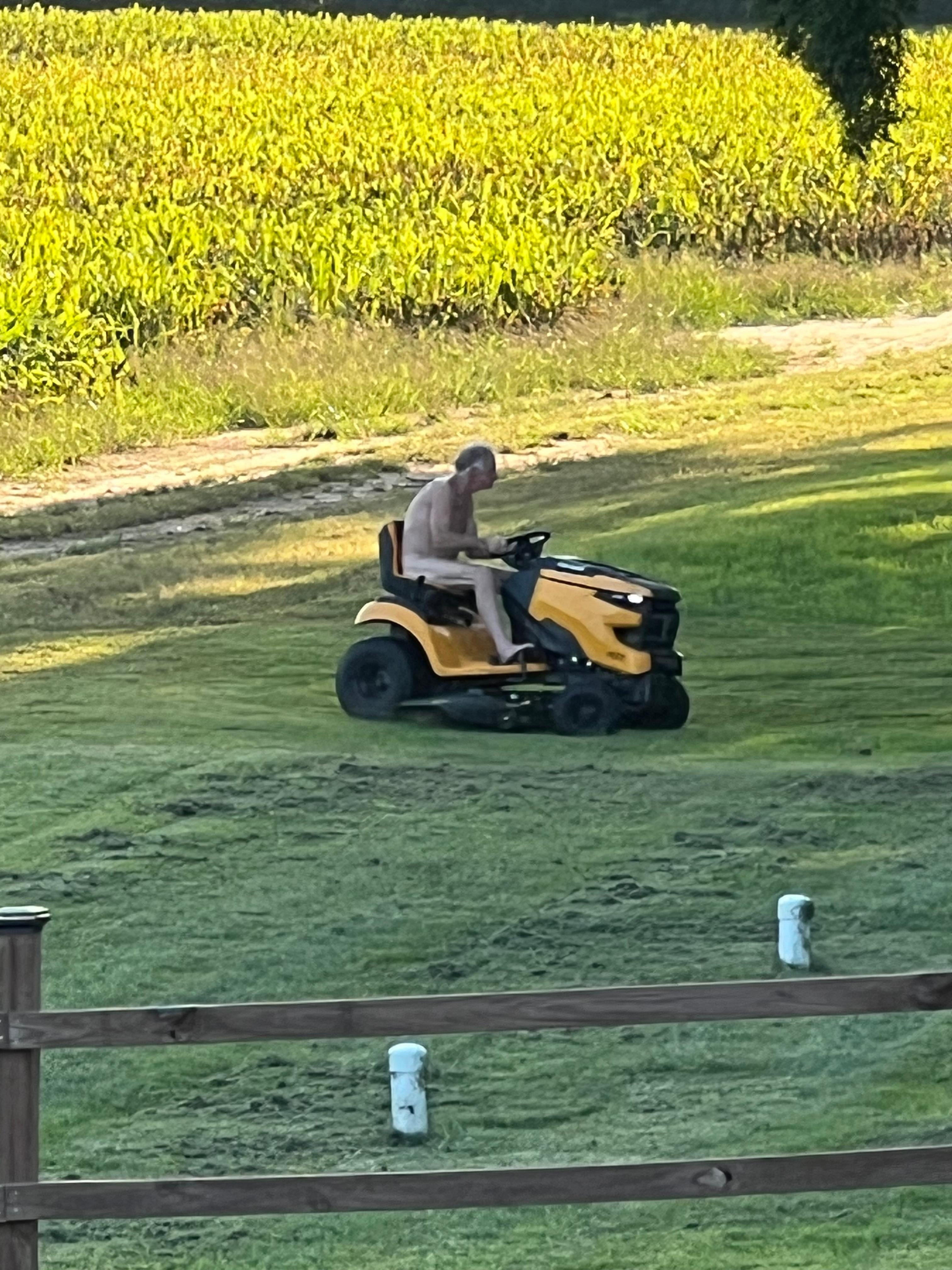 Nudest neighbor to the west mowing.