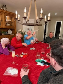 Christmas Eve family fun around the tanle