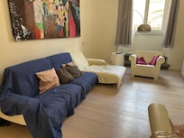 Blanket on couch because white couch was very dirty -
