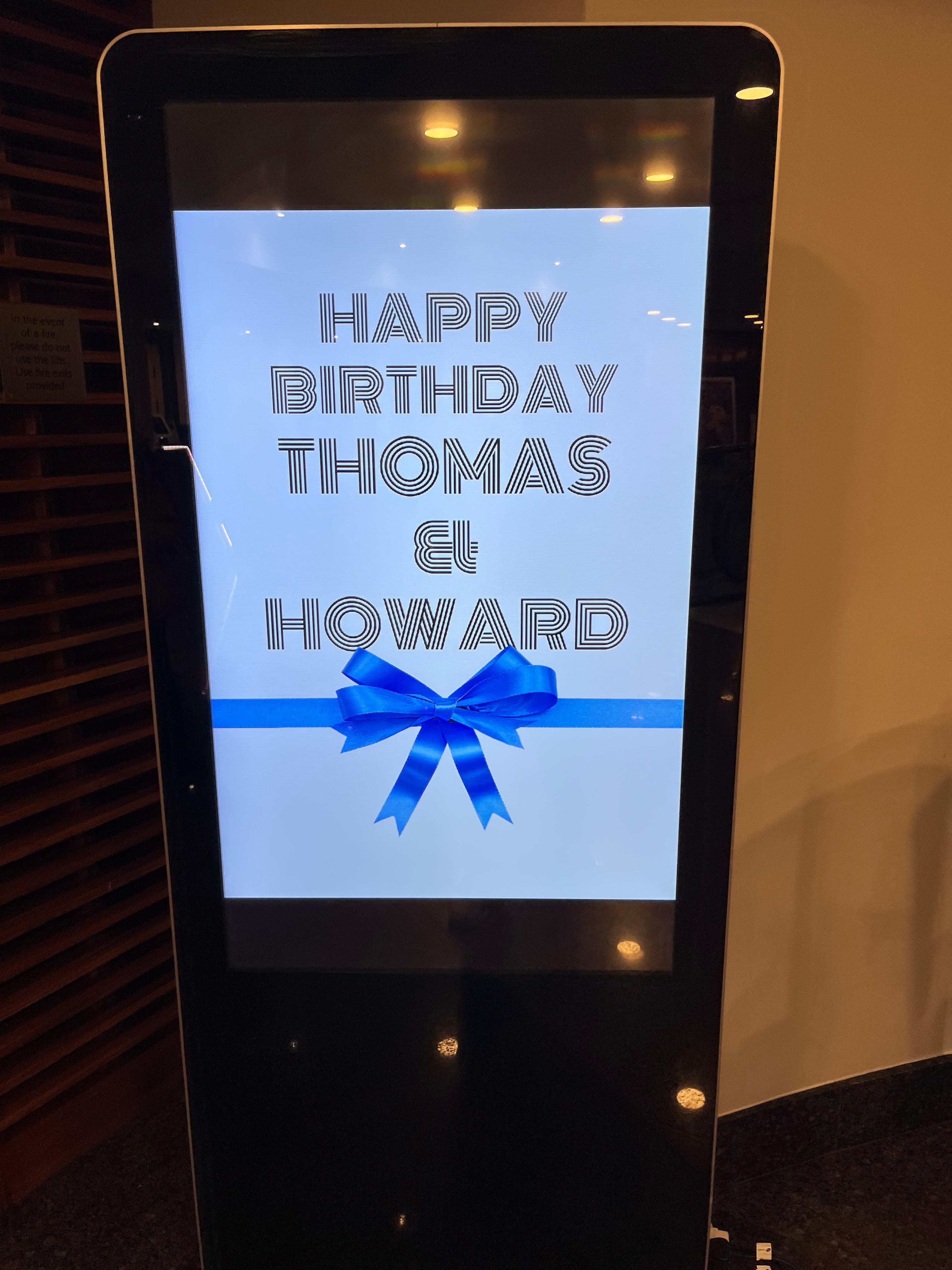 They put our twins birthday on screen in reception 