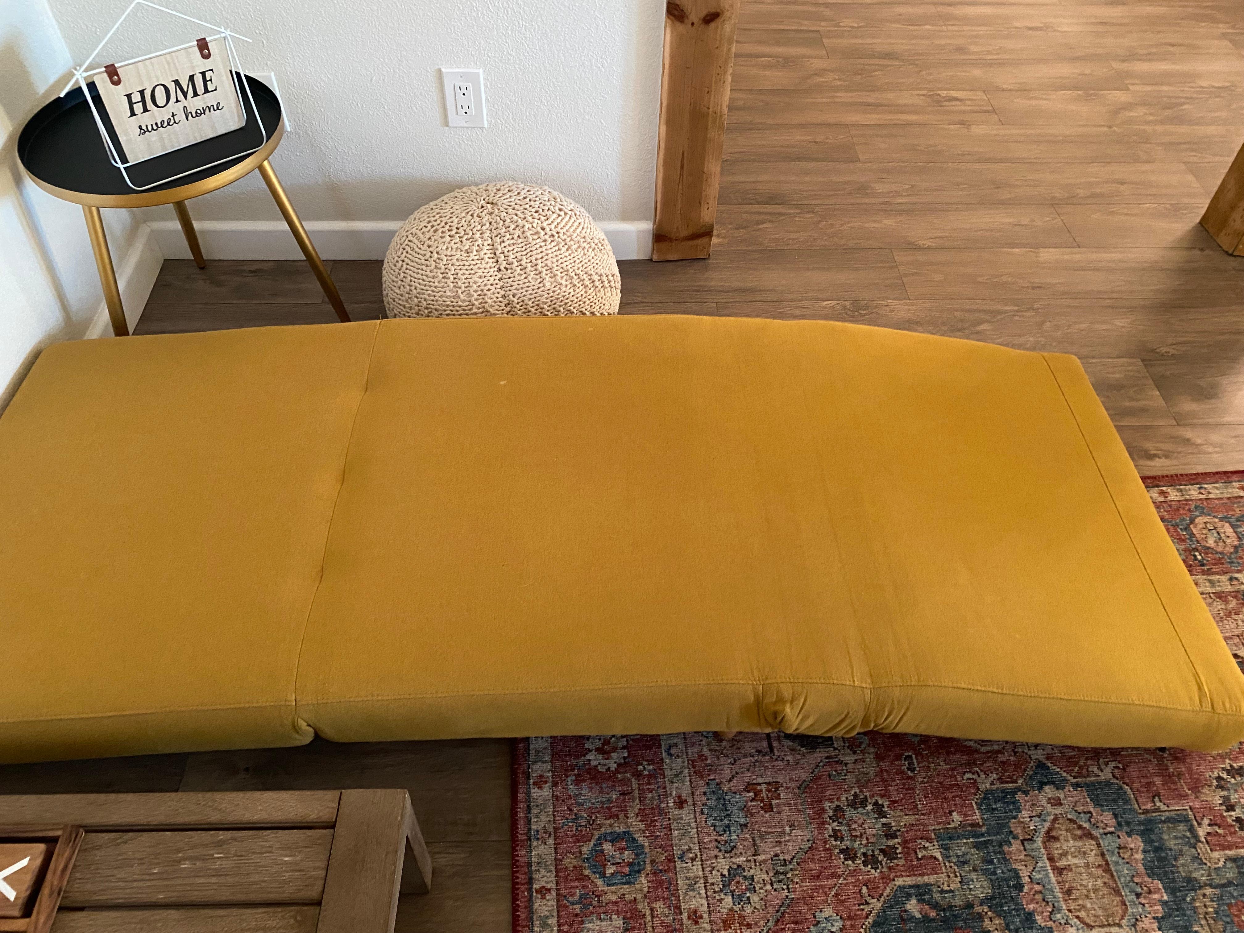 Advertised as a pull out couch