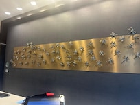A lovely dragonfly mural behind the front desk.